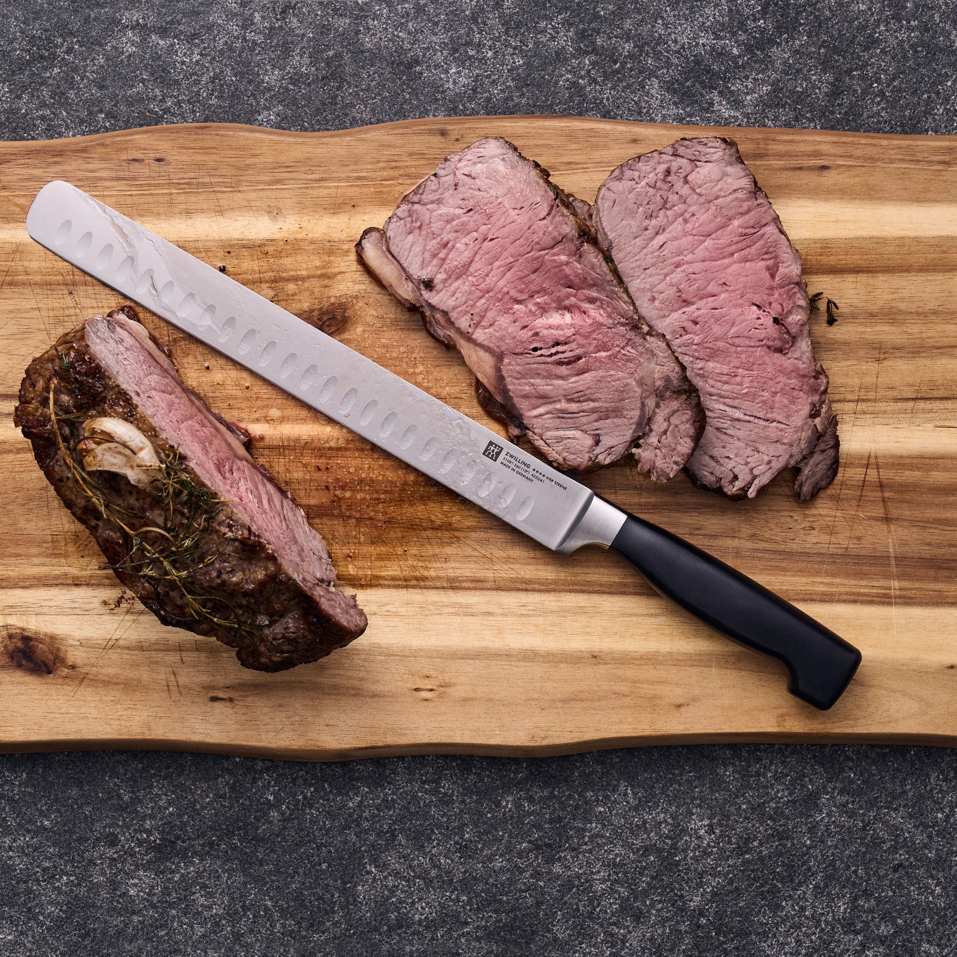 Zwilling Four star filé/trancherkniv 26 cm, Svart-rostfritt stål Zwilling